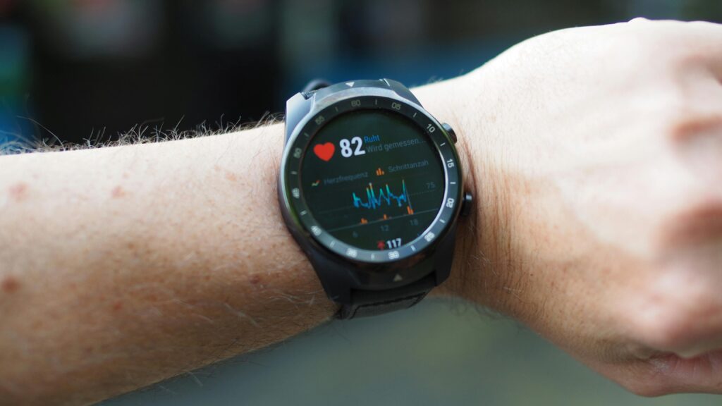 smartwatch redondo braco masculino